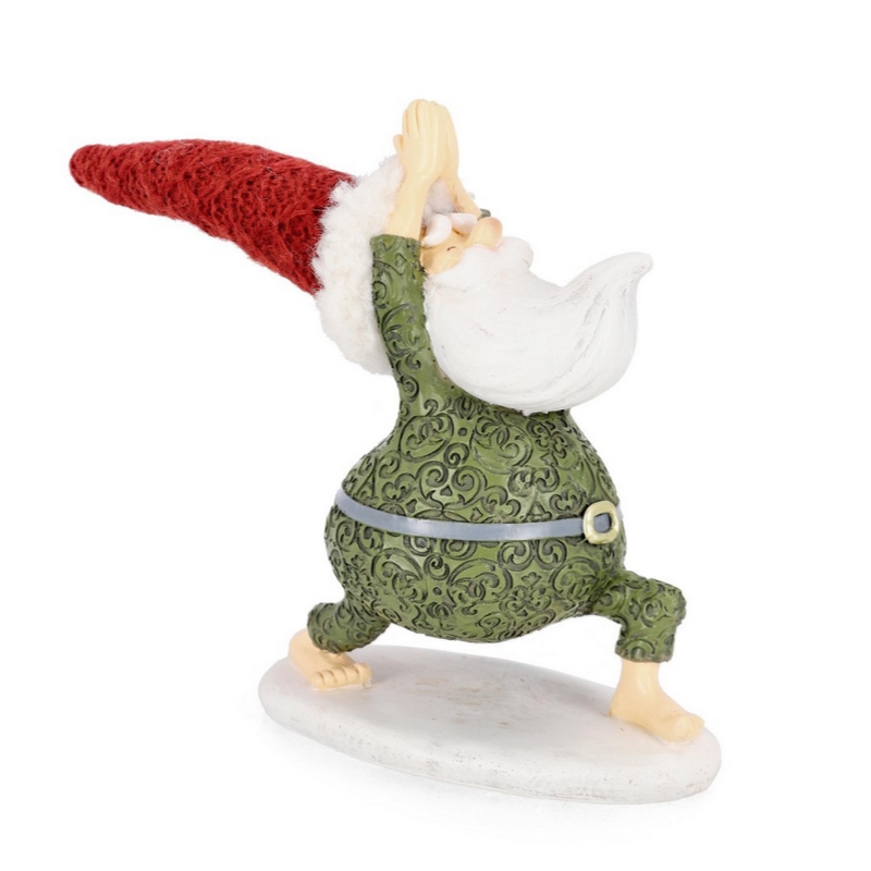Babbo Natale che fa yoga con vestito verde, decorazione natalizia da appoggio in poliresina